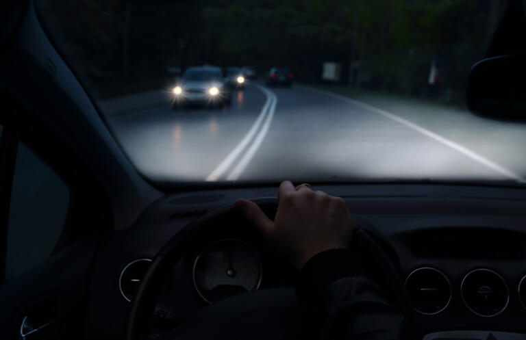 Woman driving at night after cataract surgery