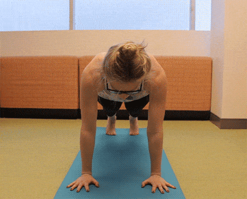 Woman performing yoga pose gif