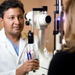 Dr. Jay Bansal performing a slit lamp examination