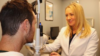Doctor Walsh at LaserVue Eye Center performing a LASIK eye exam