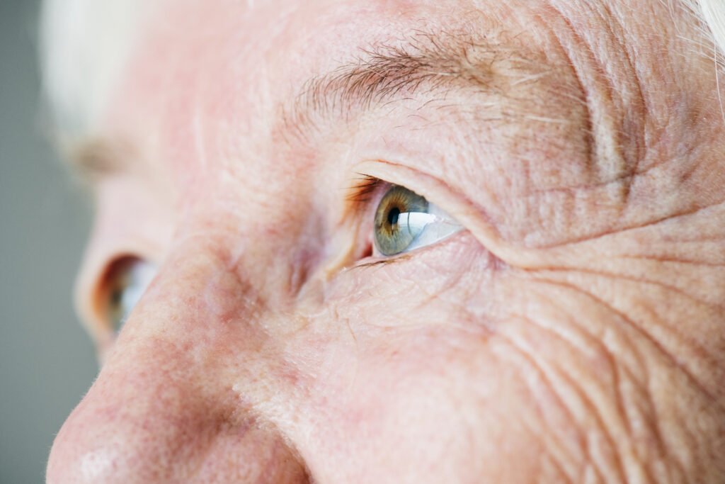 closeup side portrait white elderly woman eyes scaled.jpg