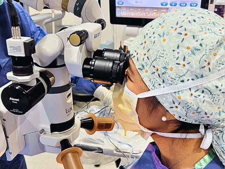 Dr. Wangyu performing eye surgery