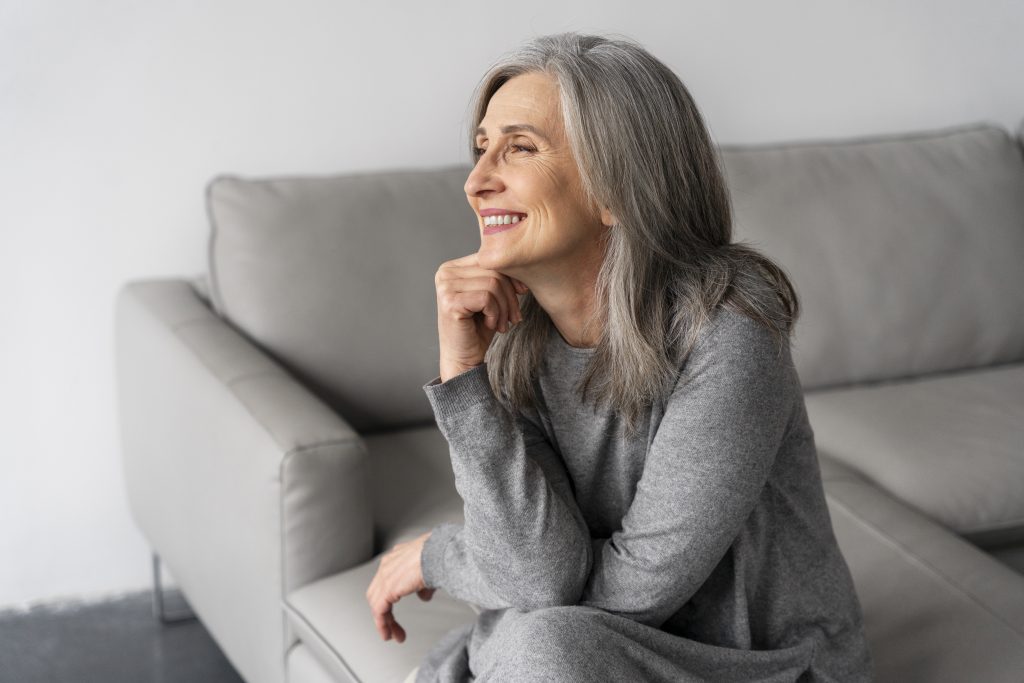 Senior woman relaxing on a sofa