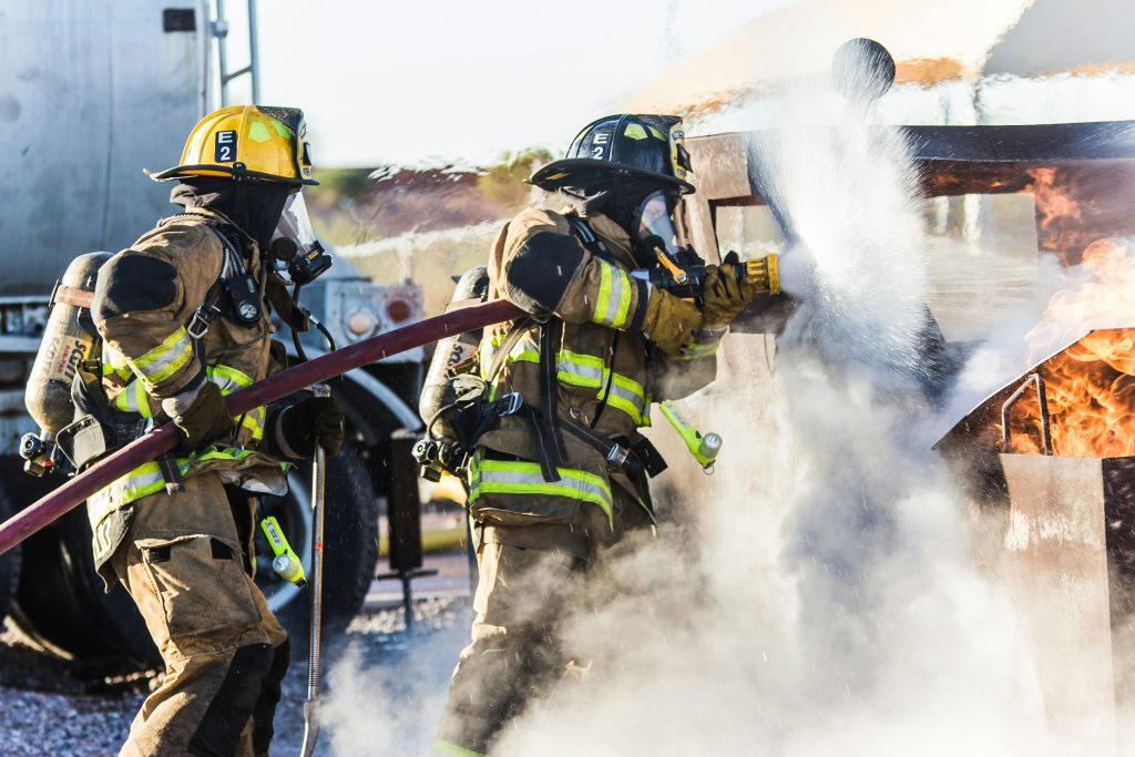 Firefighters working in heavy smoke