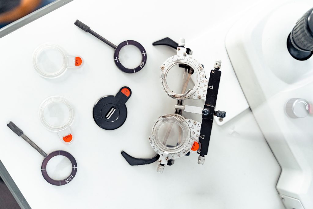 Optometric trial lens kit arranged on a white table