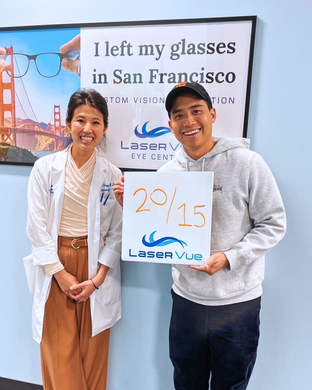 Edward S LASIK patient at LaserVue Eye Center in San Francisco standing with Dr. Stephanie Wangyu ophthalmologist and LASIK surgeon using modern technology