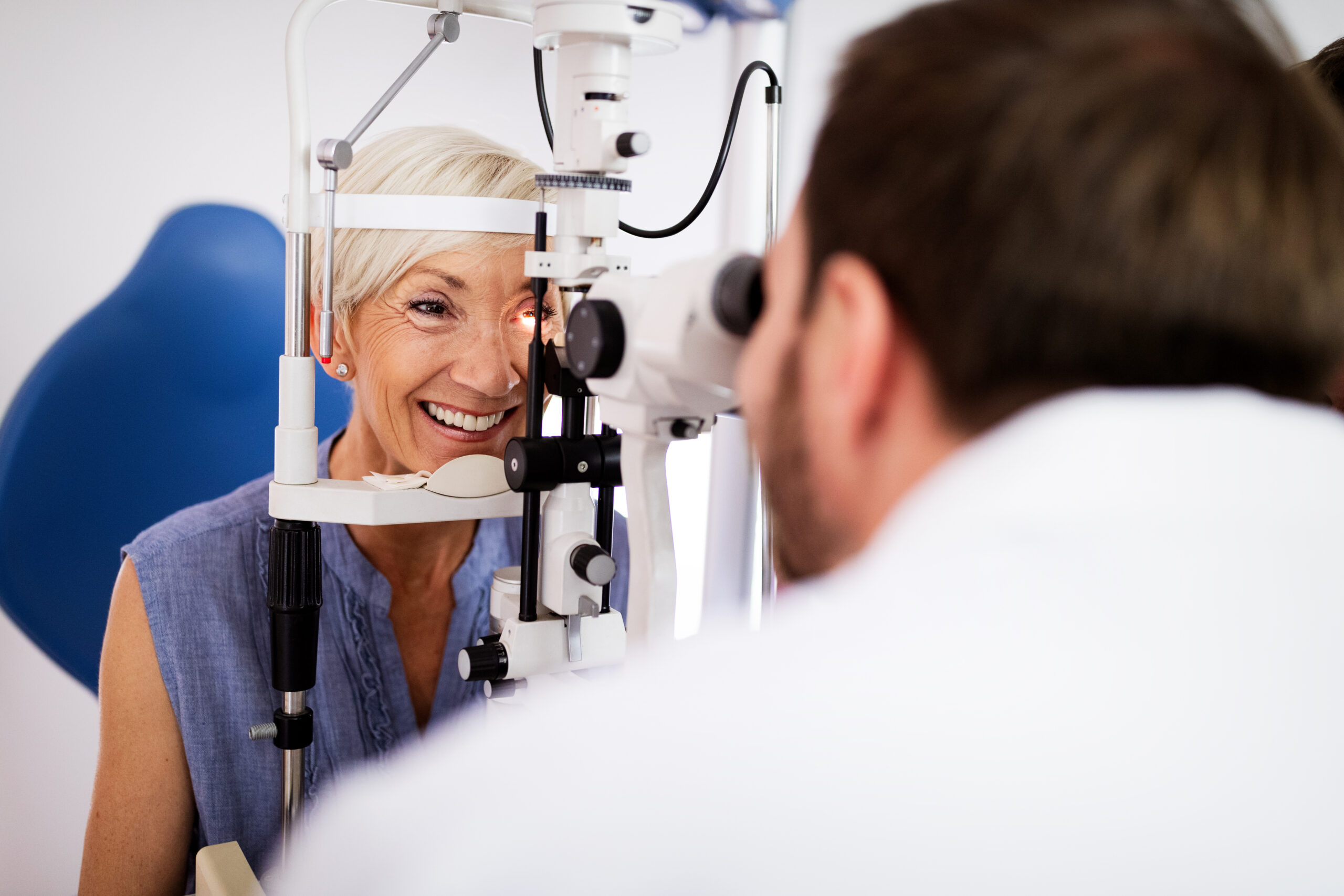 Senior woman receiving a consultation for Robotic Laser Cataract Surgery at LaserVue Eye Center