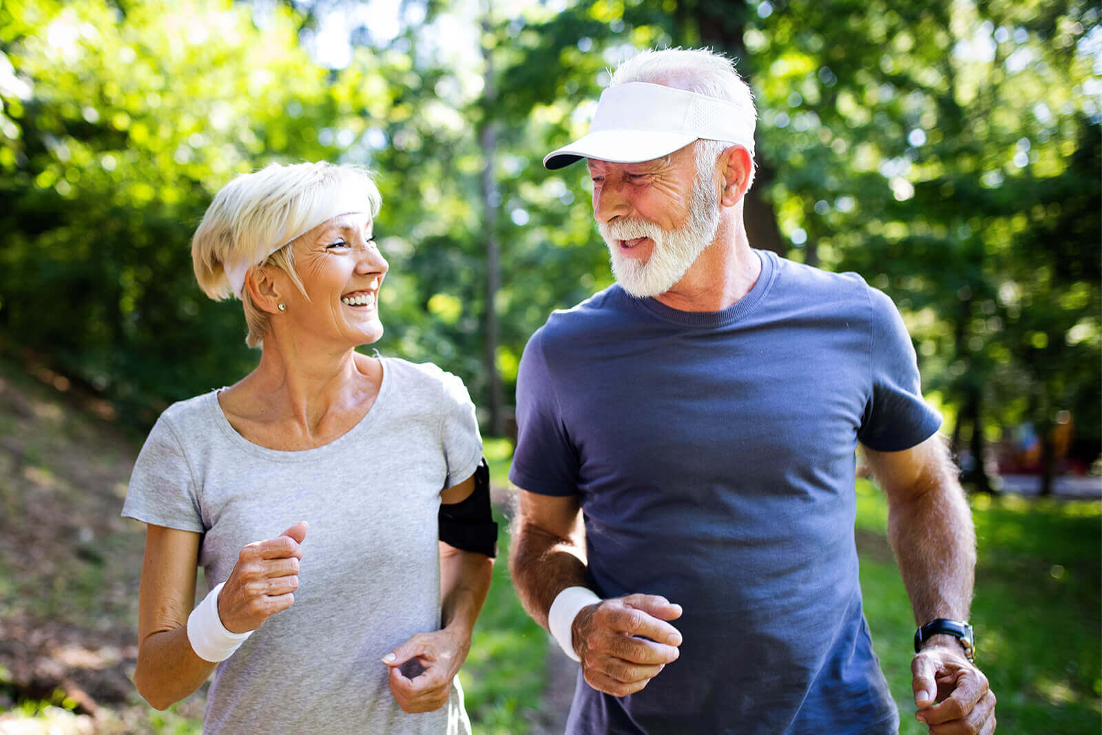 Active couple jogging in a park